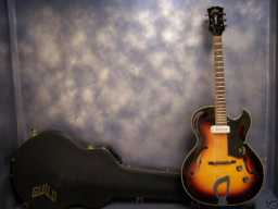 Guild T-100 1963 sunburst w-newer Guild case.jpg